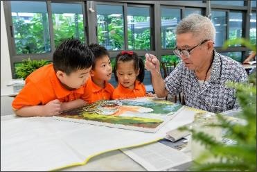 Reading activities between seniors and children